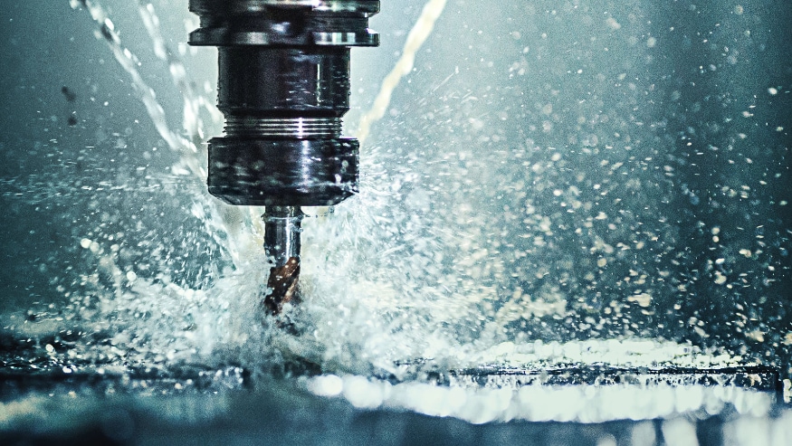 Water and an industrial drill in a manufacturing operation
