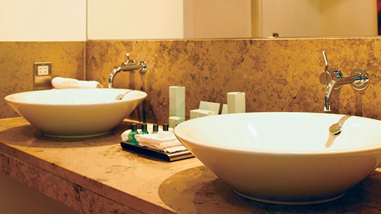 Restroom with Two Counter Mounted Sinks Restroomwithtwocountermountedsinks