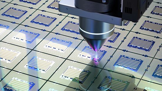 Semiconductor manufacturing stock photo, Robotic arms with silicon wafers for semiconductor manufacturing